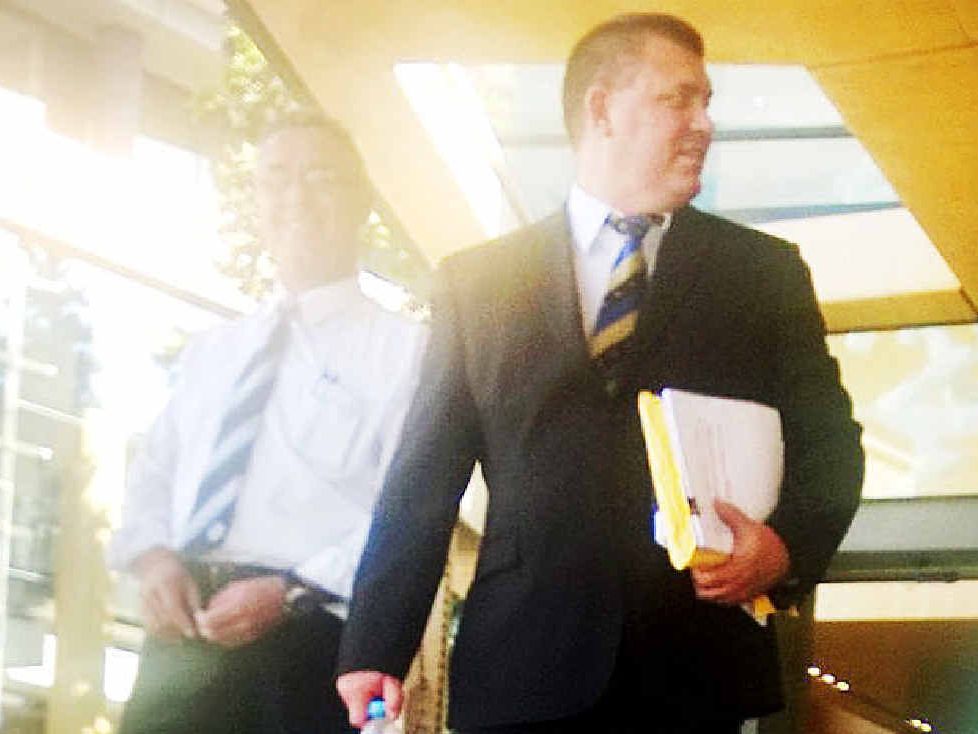 CUP CLASH: Logan detective Martin Heath Hunter (right) fronts an Ipswich court. CUP CLASH: Logan detective Martin Heath Hunter (right) fronts an Ipswich court.
