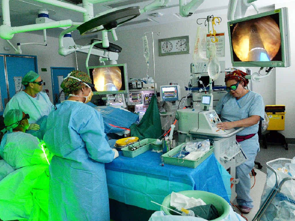 In the Operating Theatre from left, Dr Muhammad Kahloon, seated, Dr. David Kerle, Judy Bellinger, scrub nurse, and anesthetic nurse Kylie Gibson. Photo Peter Holt / Daily Mercury In the Operating Theatre from left, Dr Muhammad Kahloon, seated, Dr. David Kerle, Judy Bellinger, scrub nurse, and anesthetic nurse Kylie Gibson. Photo Peter Holt / Daily Mercury