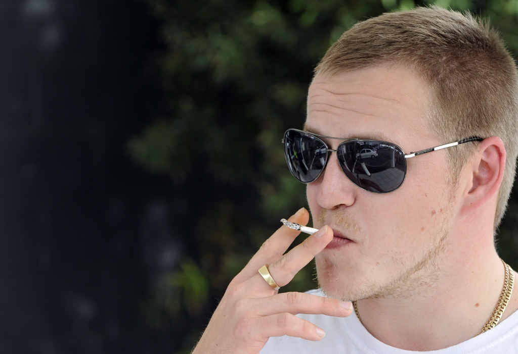 HABIT: Dmitry Smirnov says he regrets taking up smoking as a teenager, as he now finds himself in the minority among his friends. HABIT: Dmitry Smirnov says he regrets taking up smoking as a teenager, as he now finds himself in the minority among his friends.