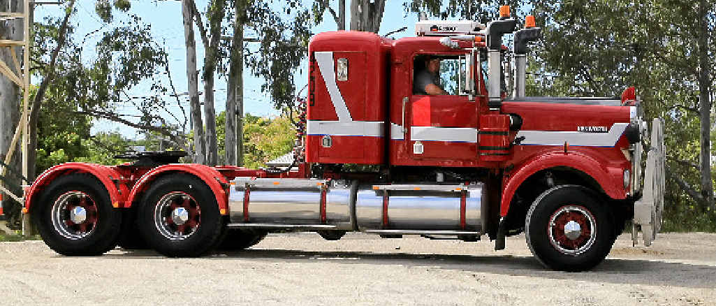 BEEP BEEP: Warren Smith drives his Kenworth into the Heritage Truck Show. BEEP BEEP: Warren Smith drives his Kenworth into the Heritage Truck Show.