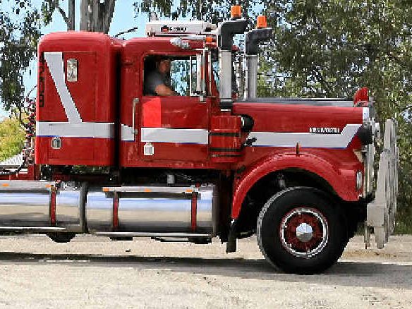 BEEP BEEP: Warren Smith drives his Kenworth into the Heritage Truck Show. BEEP BEEP: Warren Smith drives his Kenworth into the Heritage Truck Show.
