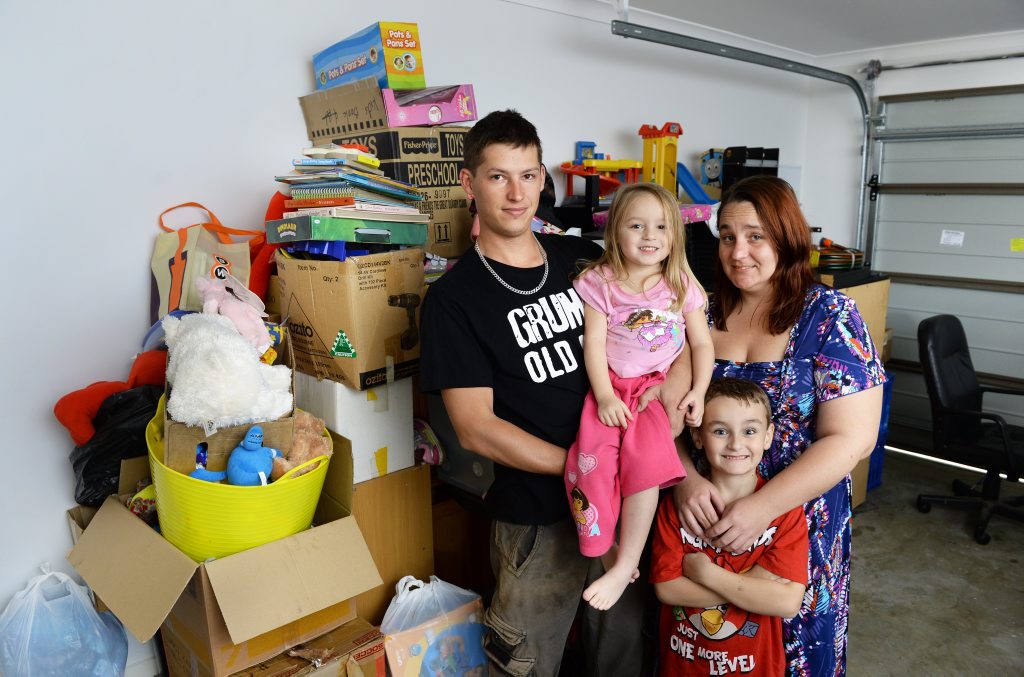 DOUBLE TROUBLE: Fire victims James Lucacevich and Michelle Stewart with children Levi, 6, and Amelia, 3, are again without a car following a crash at Goodna on Tuesday. DOUBLE TROUBLE: Fire victims James Lucacevich and Michelle Stewart with children Levi, 6, and Amelia, 3, are again without a car following a crash at Goodna on Tuesday.