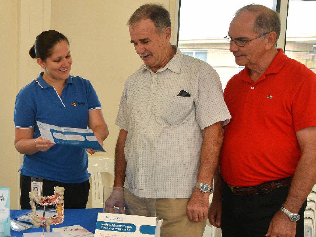 HEALTH AWARENESS: Iona West Men’s Shed chairman Syd Cowan (right) and member Allen Grant discuss the Queensland Bowel Cancer screening program with health promotions officer Cherie Cooper. HEALTH AWARENESS: Iona West Men’s Shed chairman Syd Cowan (right) and member Allen Grant discuss the Queensland Bowel Cancer screening program with health promotions officer Cherie Cooper.