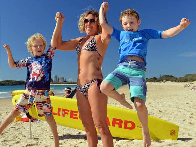 THUMBS UP: Elijah Sole,6, Danna Morrissey, and Isaac Sole,8, make the most of the beautiful weather at Mooloolaba Beach. THUMBS UP: Elijah Sole,6, Danna Morrissey, and Isaac Sole,8, make the most of the beautiful weather at Mooloolaba Beach.