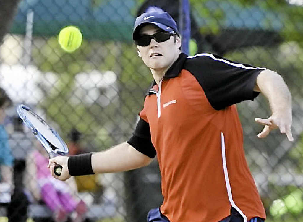 Jordan Loughanan cranks up a forehand during his match. Jordan Loughanan cranks up a forehand during his match.