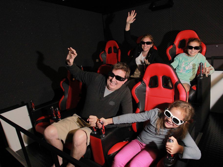 The Lopez family from Brisbane, Dale and Nerida and their daughters Elise, 8, and Claire, 10, try out the new 7D Cinema on the Mooloolaba Esplanade. Photo: Brett Wortman / Sunshine Coast Daily The Lopez family from Brisbane, Dale and Nerida and their daughters Elise, 8, and Claire, 10, try out the new 7D Cinema on the Mooloolaba Esplanade. Photo: Brett Wortman / Sunshine Coast Daily