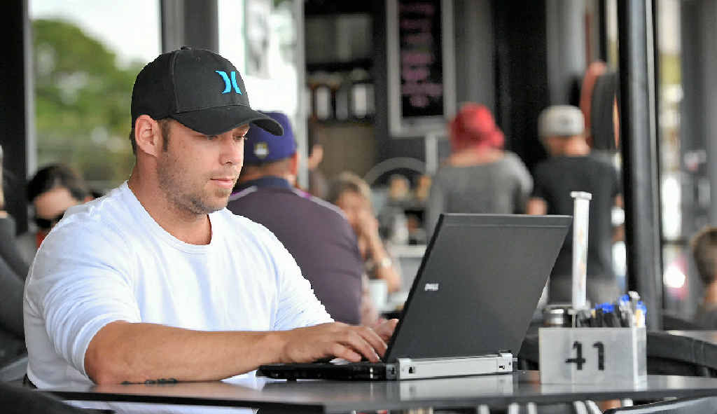 LUNCHTIME LOG-ON: Kevin McGuire enjoys the benefits of the free wi-fi available at The Coffee Club. LUNCHTIME LOG-ON: Kevin McGuire enjoys the benefits of the free wi-fi available at The Coffee Club.