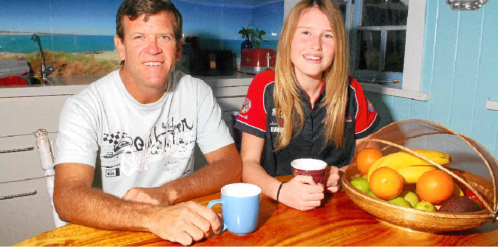 ON THE MONEY: Fred Stokes and daughter Phoebe have their electricity-saving measures down pat. ON THE MONEY: Fred Stokes and daughter Phoebe have their electricity-saving measures down pat.