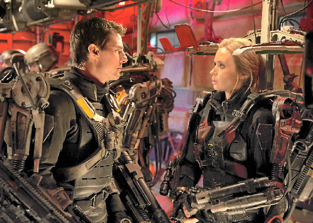 AT THE MOVIES: Tom Cruise and Emily Blunt in a scene from the movie Edge of Tomorrow. Supplied by Warner Bros. AT THE MOVIES: Tom Cruise and Emily Blunt in a scene from the movie Edge of Tomorrow. Supplied by Warner Bros.