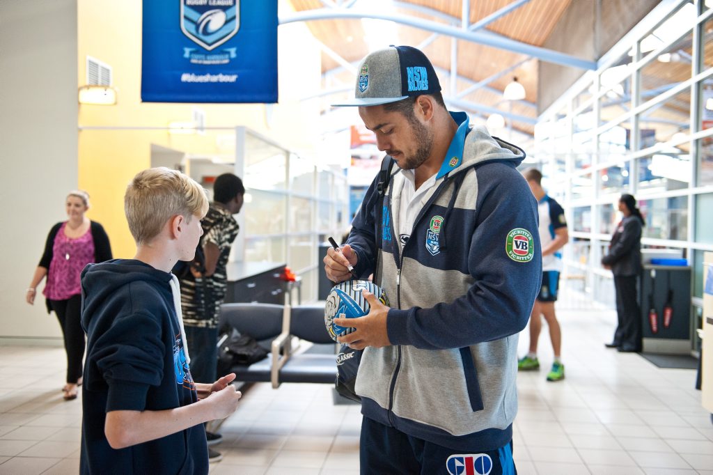 Jarryd Hayne signs a ball for Bryce Sully as the Blues fly out of Coffs Harbour. Jarryd Hayne signs a ball for Bryce Sully as the Blues fly out of Coffs Harbour.
