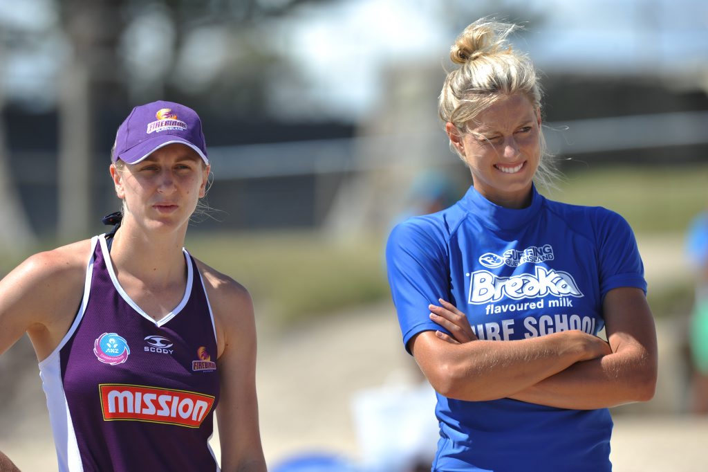 (left) Clare McMeniman and Laura Geitz from Qld Firebirds netball at surfing training at Alex Headland as part of a pre-season camp on the Sunshine Coast. (left) Clare McMeniman and Laura Geitz from Qld Firebirds netball at surfing training at Alex Headland as part of a pre-season camp on the Sunshine Coast.