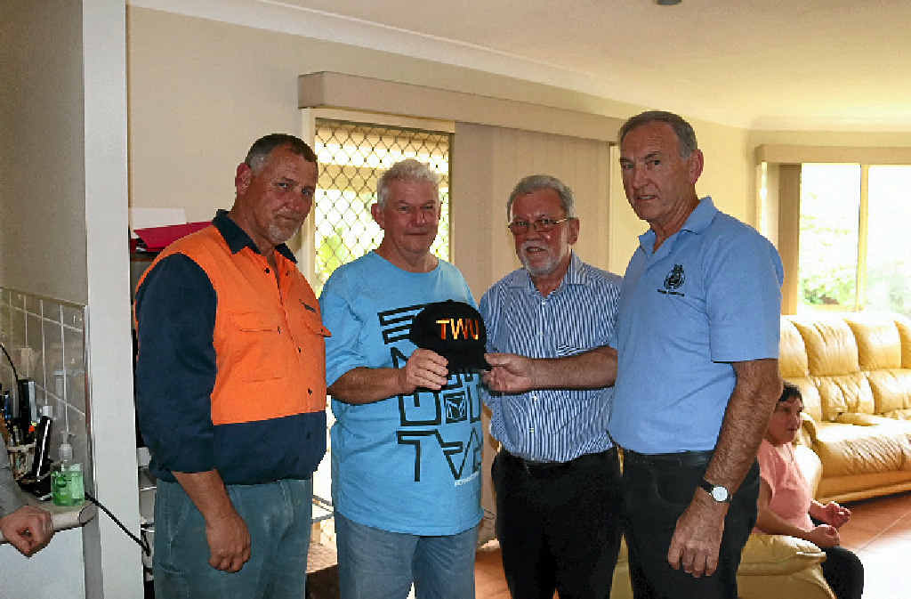 HELPING HAND: Hanson driver Brian Smith, Mark Wilson, Wayne Forno and TWU NSW Branch president George Clarke. HELPING HAND: Hanson driver Brian Smith, Mark Wilson, Wayne Forno and TWU NSW Branch president George Clarke.
