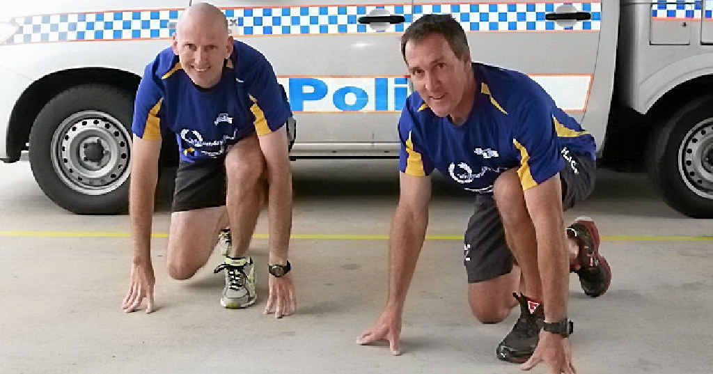 READY TO RUN: Sergeants Nathan Blain and Graham Pettigrew are part of the ’Slow Men Running’ team competing in this year’s Whitsunday Running Festival. (The team also features Jon Kent and Steve O’Connell)