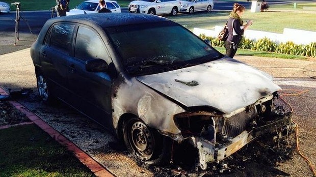 The torched car. Photo: Kendall Gilding/Seven News The torched car. Photo: Kendall Gilding/Seven News