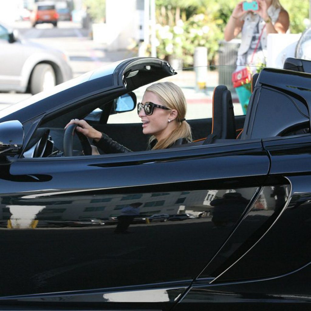 Paris Hilton in her new wheels. Paris Hilton in her new wheels.