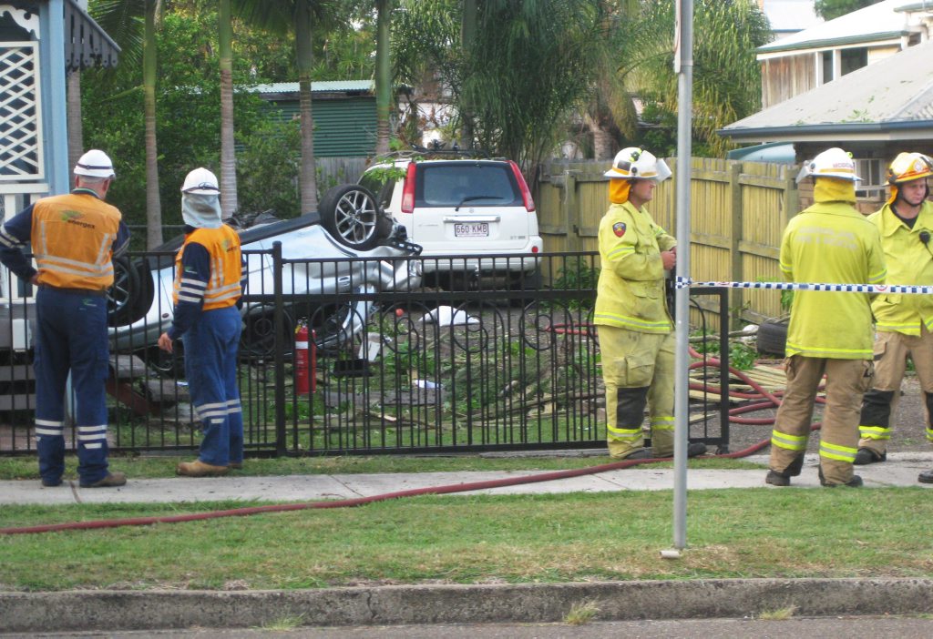 Emergency services in action at the Booval crash site. Emergency services in action at the Booval crash site.