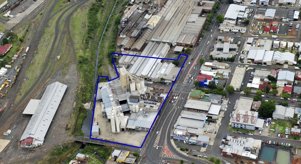 The 1.8ha Allied Mills site at the corner of Ruthven St and Chalk Dr is being marketed to developers across Australia and Asia. The 1.8ha Allied Mills site at the corner of Ruthven St and Chalk Dr is being marketed to developers across Australia and Asia.