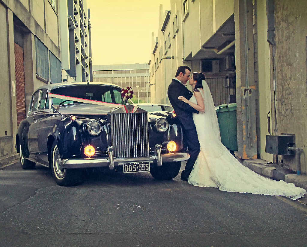TIMELESS SCENE: Matt and Kate Le Lacheur were happily married during a day featuring a vintage theme. They are pictured in front of their classy ride from Rockhampton Luxury Limousines. TIMELESS SCENE: Matt and Kate Le Lacheur were happily married during a day featuring a vintage theme. They are pictured in front of their classy ride from Rockhampton Luxury Limousines.
