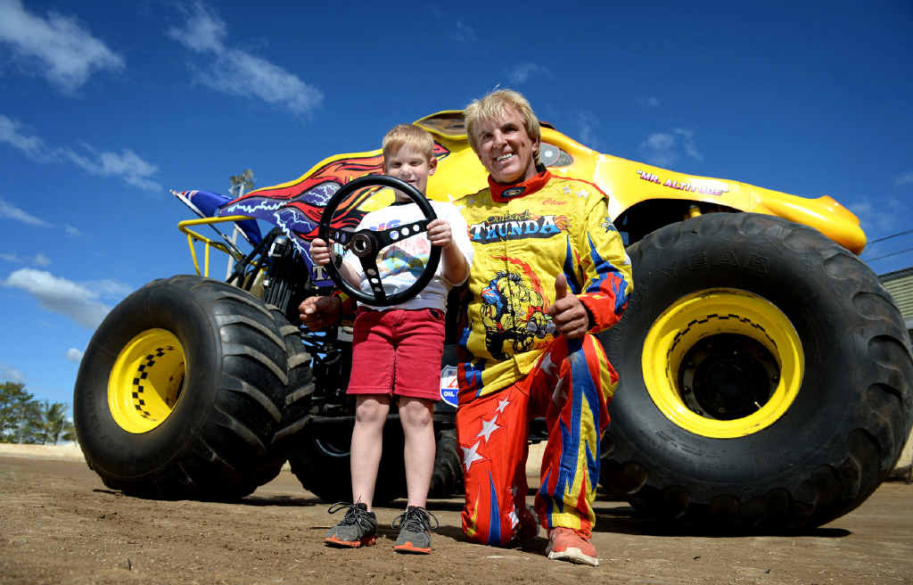 RIDE OF A LIFETIME: Connor Cox got behind the wheel of monster truck Outback Thunda with driver Clive Featherby. RIDE OF A LIFETIME: Connor Cox got behind the wheel of monster truck Outback Thunda with driver Clive Featherby.