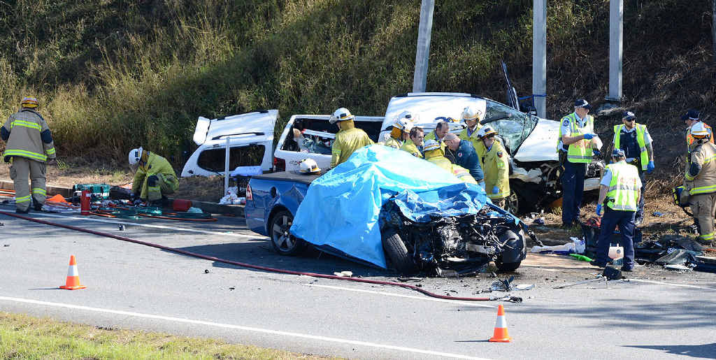 HORROR CRASH: Emergency workers at the scene of a fatal crash on the Cunningham Hwy, near the Redbank Plains Rd exit. HORROR CRASH: Emergency workers at the scene of a fatal crash on the Cunningham Hwy, near the Redbank Plains Rd exit.