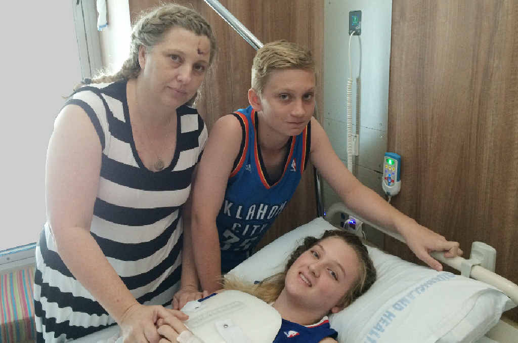 ROAD TO RECOVERY: Rockhampton’s Halliday family of mum Fiona, Chandler and daughter Elysse who is in Mackay Base Hospital with spinal injuries. Inset: The RACQ CQ Rescue choppern at the crash scene. ROAD TO RECOVERY: Rockhampton’s Halliday family of mum Fiona, Chandler and daughter Elysse who is in Mackay Base Hospital with spinal injuries. Inset: The RACQ CQ Rescue choppern at the crash scene.