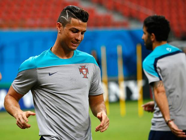 The world's best player has never been afraid of rocking some perfectly coiffed barnets, but this one looks as if his barber dropped the clippers mid-shave. GETTY The world's best player has never been afraid of rocking some perfectly coiffed barnets, but this one looks as if his barber dropped the clippers mid-shave. GETTY
