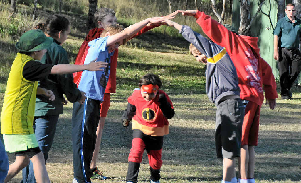 SOTE students encourage Alexander Kotsopoulos as he nears the finish of cross country.