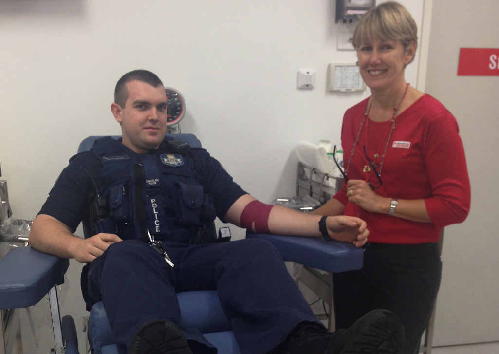 GIVE BLOOD: Police officer Dale Cook rolls up his sleeves for the Queensland Emergency Services Challenge with the help of nurse Terri Fallis. GIVE BLOOD: Police officer Dale Cook rolls up his sleeves for the Queensland Emergency Services Challenge with the help of nurse Terri Fallis.