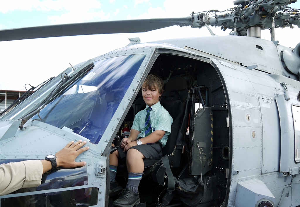 Bailey Connor sitting in a helicopter at a defence force open day at Rockhampton Showgrounds Bailey Connor sitting in a helicopter at a defence force open day at Rockhampton Showgrounds