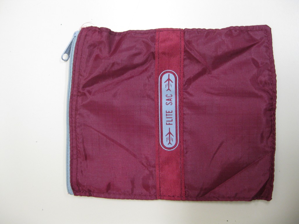 A large sum of money was found in this pouch at a Coolangatta charity shop. A large sum of money was found in this pouch at a Coolangatta charity shop.