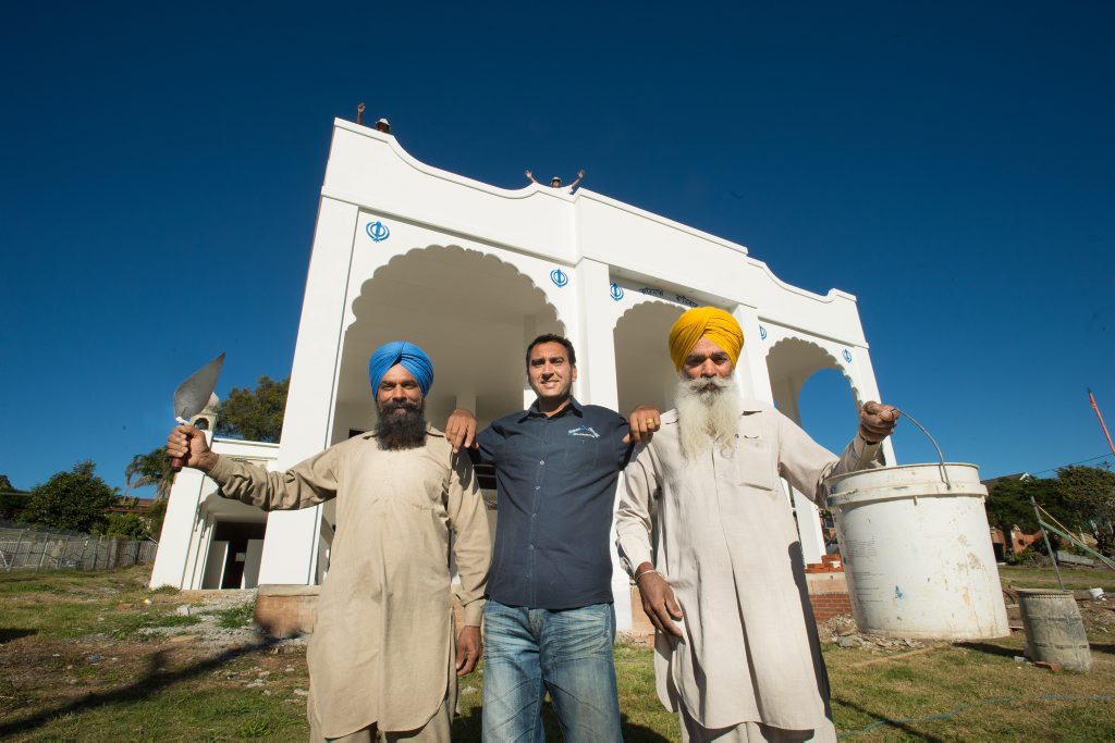 GETTING CLOSER: Jagtar Singh and Charn Singh with builder Andrew Hundal on site at Australia's first Sikh temple, with upgrades nearing completion. Photo: Trevor Veale / Coffs Coast Advocate GETTING CLOSER: Jagtar Singh and Charn Singh with builder Andrew Hundal on site at Australia's first Sikh temple, with upgrades nearing completion. Photo: Trevor Veale / Coffs Coast Advocate
