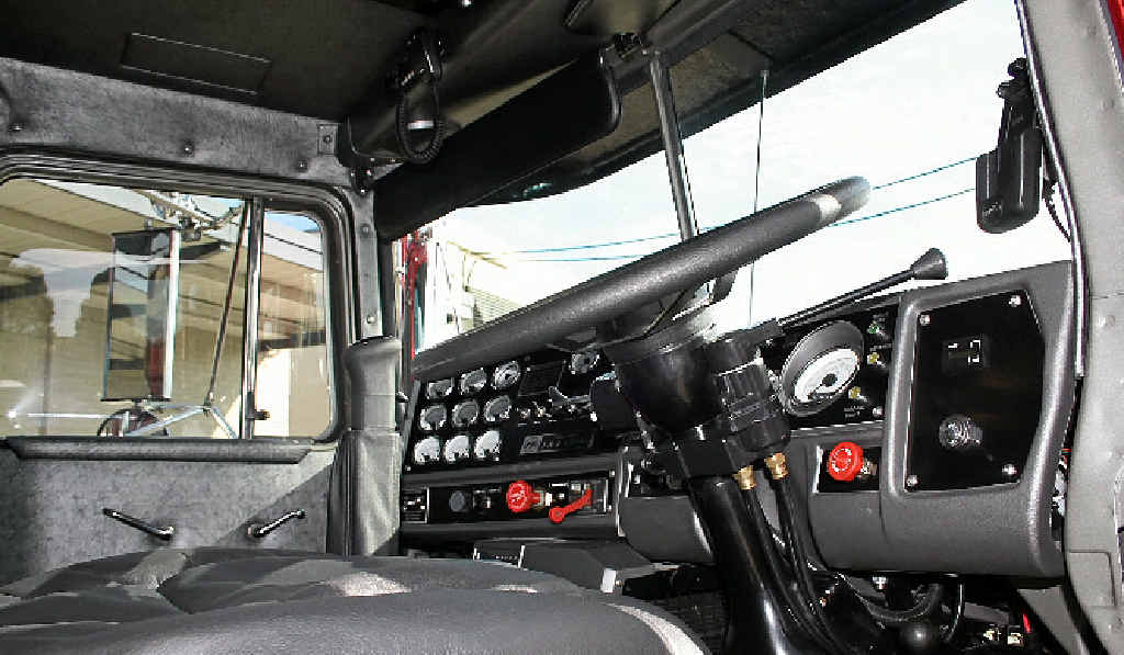Inside the cab PJs added new dash and white-face gauges and did a full re-trim. Inside the cab PJs added new dash and white-face gauges and did a full re-trim.