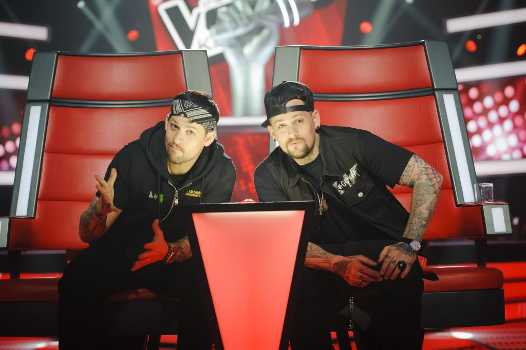 Joel, left, and Benji Madden in their custom chair on The Voice Kids. Joel, left, and Benji Madden in their custom chair on The Voice Kids.