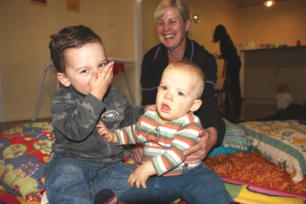 Olive Tree Children's Centre carer Debbie Catling with brothers Lachlan (left) and Mitchell Sullivan. Photo Chris Calcino / The Chronicle Olive Tree Children's Centre carer Debbie Catling with brothers Lachlan (left) and Mitchell Sullivan. Photo Chris Calcino / The Chronicle
