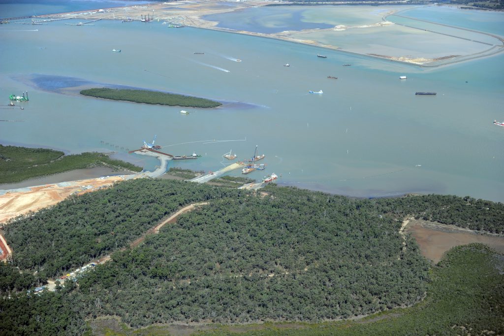 Aerial view of Curtis Island, LNG sites. Dredging and Fishermans landing in the background. Aerial view of Curtis Island, LNG sites. Dredging and Fishermans landing in the background.