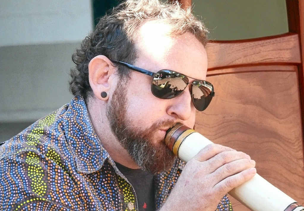TUNING IN: Renowned didgeridoo player Kristian Benton plays for the crowd at the launch of the Lindt Exhibition Research Project at the Grafton Regional Gallery on Wednesday. Photo: Tim Howard TUNING IN: Renowned didgeridoo player Kristian Benton plays for the crowd at the launch of the Lindt Exhibition Research Project at the Grafton Regional Gallery on Wednesday. Photo: Tim Howard