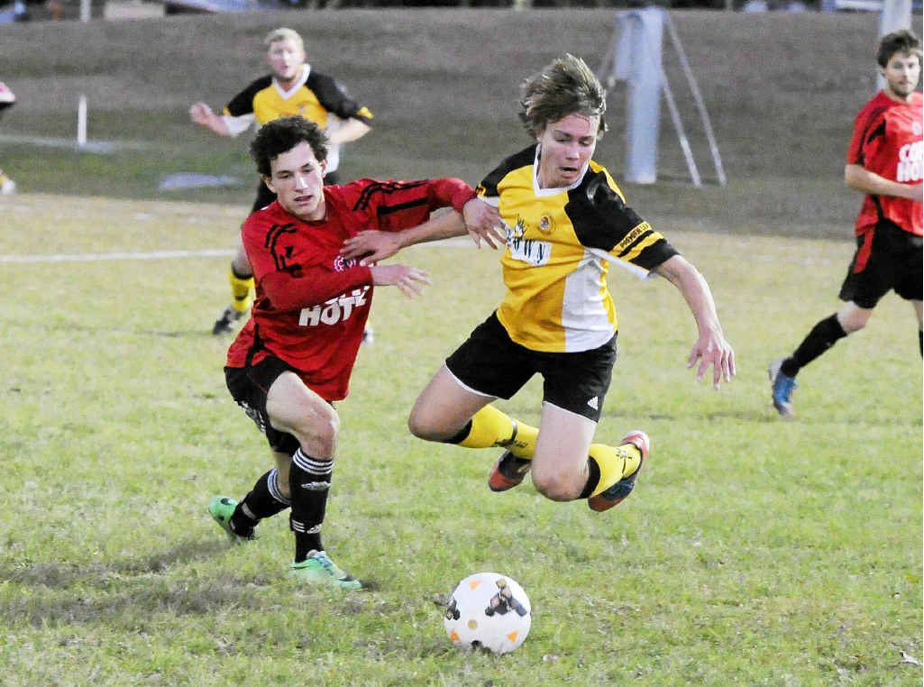 AIRBORNE: Westlawn Tiger Cormack Grant finds some air during his side’s 2-1 loss to North Coast Football Premier League leaders Coffs Lions. Photo: Debrah Novak AIRBORNE: Westlawn Tiger Cormack Grant finds some air during his side’s 2-1 loss to North Coast Football Premier League leaders Coffs Lions. Photo: Debrah Novak