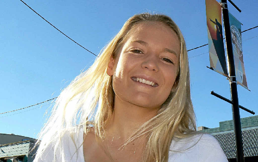 CAUSING A STIR: Evans Head surfer and model Kirrah Cooke, 17, doesn’t understand what all the fuss is about her being photographed in a bikini. INSET: the banner that caused all the trouble. CAUSING A STIR: Evans Head surfer and model Kirrah Cooke, 17, doesn’t understand what all the fuss is about her being photographed in a bikini. INSET: the banner that caused all the trouble.