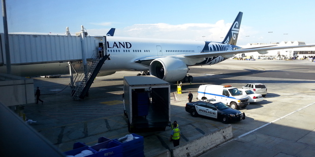 The Air New Zealand plane after it landed in Los Angeles following the death on board of a woman in her mid-50s. The Air New Zealand plane after it landed in Los Angeles following the death on board of a woman in her mid-50s.