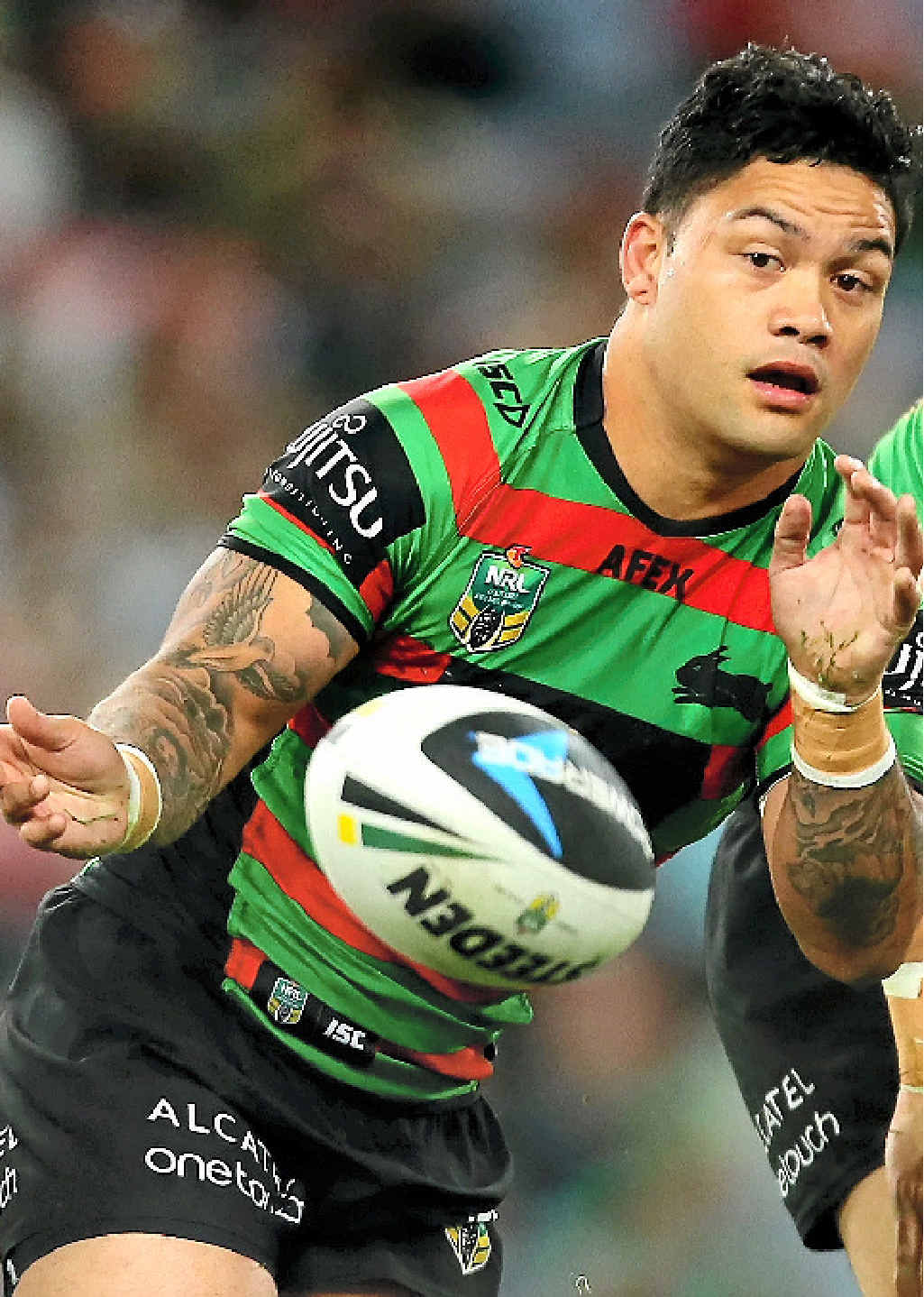 Issac Luke of the Rabbitohs passes against the Gold Coast Titans at ANZ Stadium in Sydney last night. Issac Luke of the Rabbitohs passes against the Gold Coast Titans at ANZ Stadium in Sydney last night.