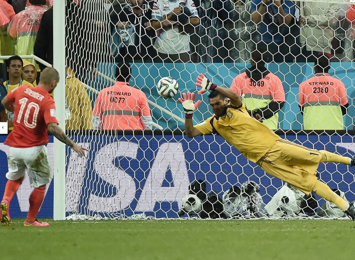 Argentina's Sergio Romero saves Wesley Sneijder's penalty, knocking out the Netherlands and ushering Argentina into the World Cup final against Germany. Argentina's Sergio Romero saves Wesley Sneijder's penalty, knocking out the Netherlands and ushering Argentina into the World Cup final against Germany.