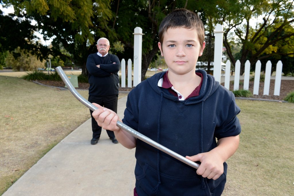 BRAVE BOY: Eleven-year-old Sam Connolly whacked a would-be thief with a metal pole when he found him in his house. Pictured with his father Ian Connolly. BRAVE BOY: Eleven-year-old Sam Connolly whacked a would-be thief with a metal pole when he found him in his house. Pictured with his father Ian Connolly.