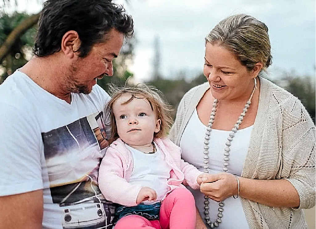 SHOCK DIAGNOSIS: Joel and Catherine Topliff with their daughter Ellie, who has a very rare illness called Tay-Sachs disease that has no cure. The family needs to raise $10,000 for an airway clearance device. SHOCK DIAGNOSIS: Joel and Catherine Topliff with their daughter Ellie, who has a very rare illness called Tay-Sachs disease that has no cure. The family needs to raise $10,000 for an airway clearance device.