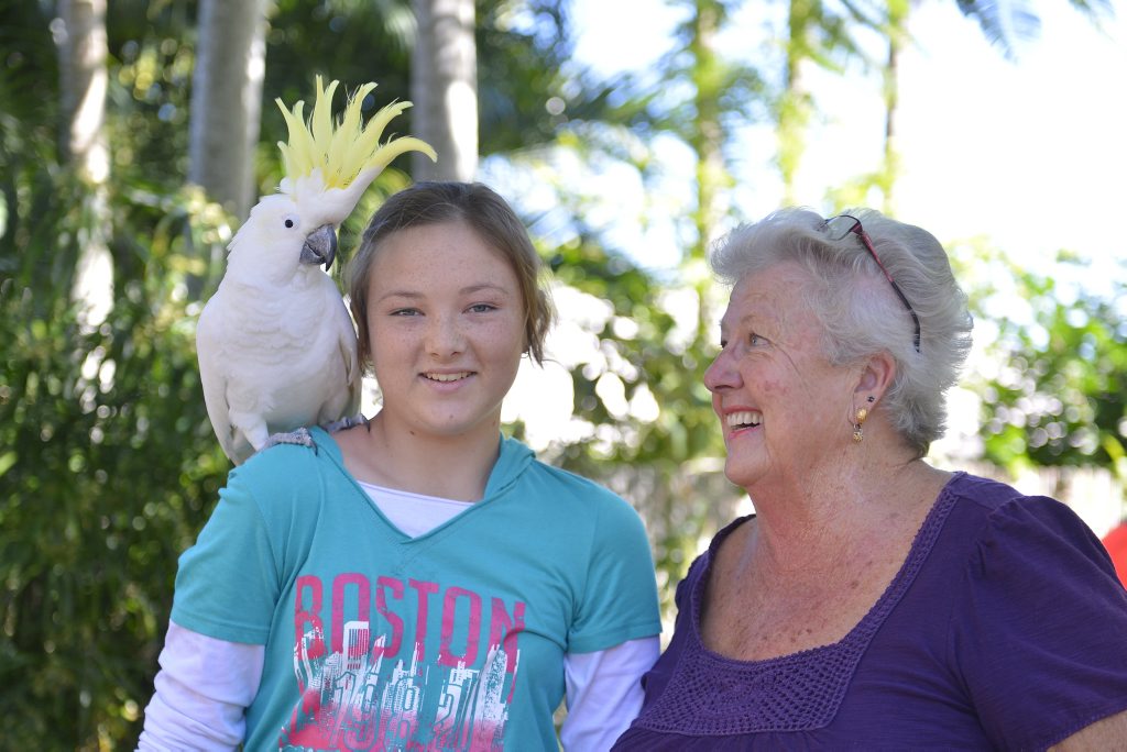 Tegan Hallcroft, 12, with Lorraine de Roode and their talkative cockatoo Darling. Photo Brenda Strong / The Observer Tegan Hallcroft, 12, with Lorraine de Roode and their talkative cockatoo Darling. Photo Brenda Strong / The Observer
