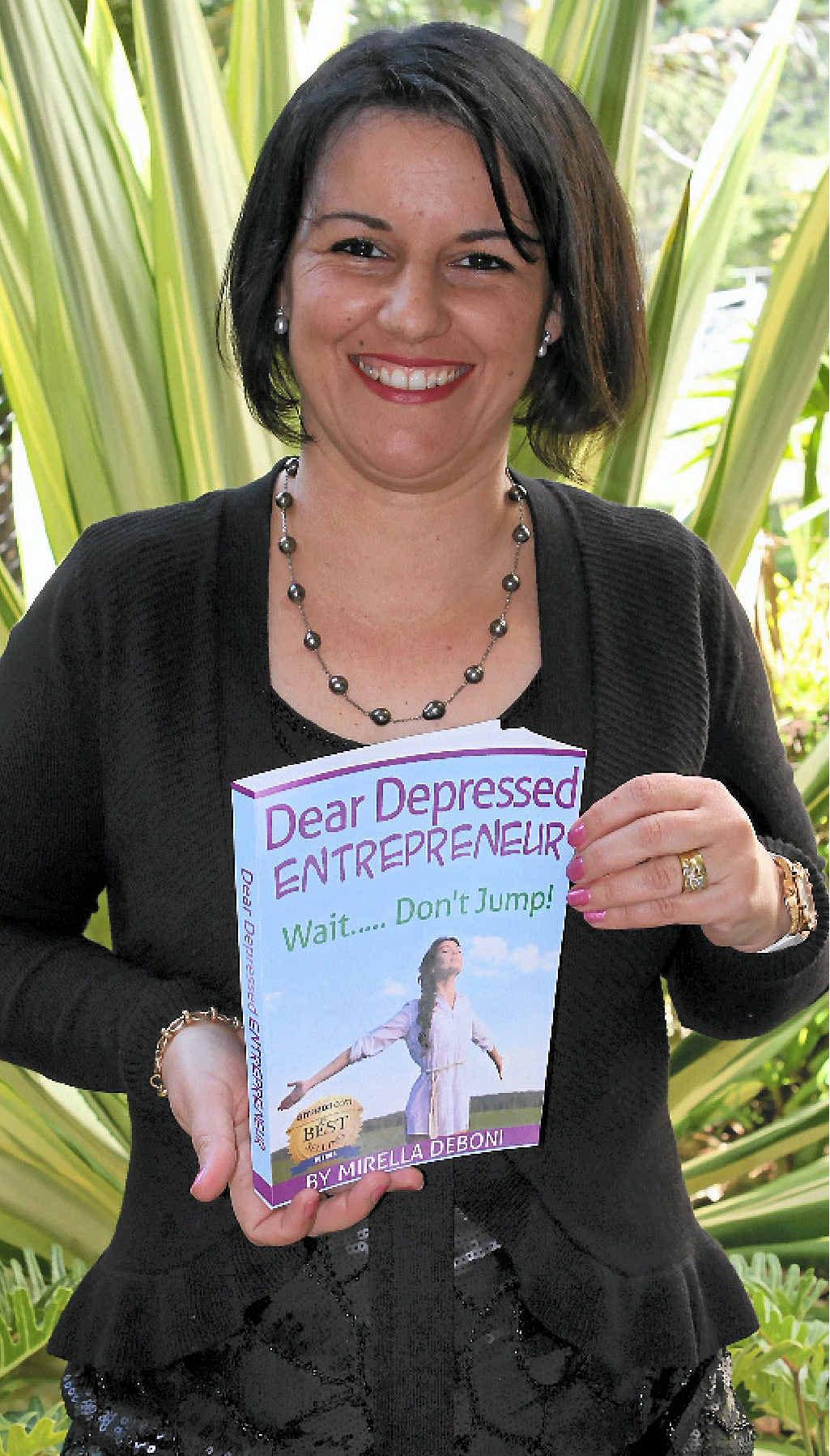 NUMBER ONE: Mt Julian resident Mirella DeBoni is celebrating international and Australia-wide success with her series of self help books including the number one title Dear Depressed Entrepreneur, Wait, Don’t Jump. NUMBER ONE: Mt Julian resident Mirella DeBoni is celebrating international and Australia-wide success with her series of self help books including the number one title Dear Depressed Entrepreneur, Wait, Don’t Jump.