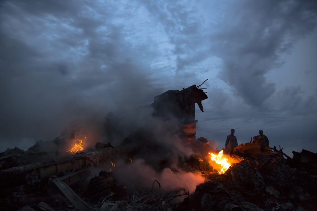 The downed passenger plane near the village of Hrabove, Ukraine, Thursday, July 17, 2014. (AP Photo/Dmitry Lovetsky) The downed passenger plane near the village of Hrabove, Ukraine, Thursday, July 17, 2014. (AP Photo/Dmitry Lovetsky)