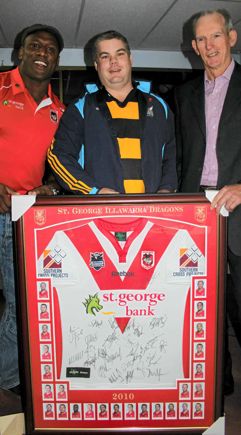 Wayne Bennett often returns to his Rose City roots for various functions, this one back in 2011 for the Cowboys flood fundraiser. Pictured also is retired Dragons winger Wendell Sailor (left) and buyer Neil McCosker. Wayne Bennett often returns to his Rose City roots for various functions, this one back in 2011 for the Cowboys flood fundraiser. Pictured also is retired Dragons winger Wendell Sailor (left) and buyer Neil McCosker.