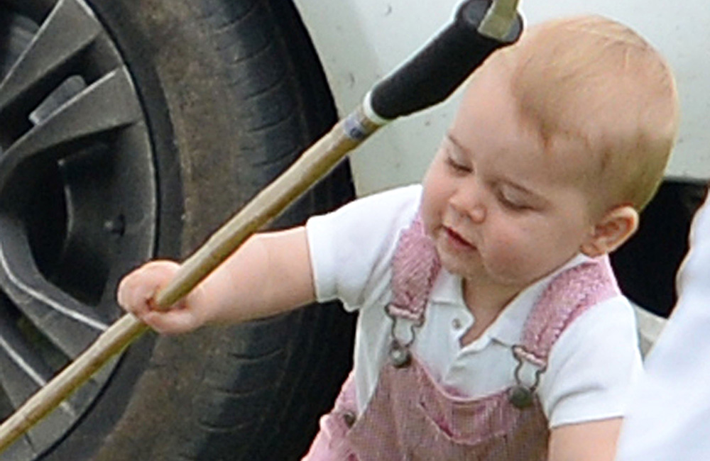 Prince George in a similar outfit to the one he was pictured in for his first royal portrait Prince George in a similar outfit to the one he was pictured in for his first royal portrait
