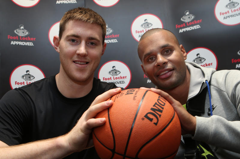 Australian San Antonio Spurs basketball stars Aron Baynes (L) and Patty Mills pose for a photograph at a publicity event in Melbourne, Tuesday, July 15, 2014. Mills is the first indigenous Australian to win the NBA championship title and he has used the break to have surgery on his shoulder. Australian San Antonio Spurs basketball stars Aron Baynes (L) and Patty Mills pose for a photograph at a publicity event in Melbourne, Tuesday, July 15, 2014. Mills is the first indigenous Australian to win the NBA championship title and he has used the break to have surgery on his shoulder.