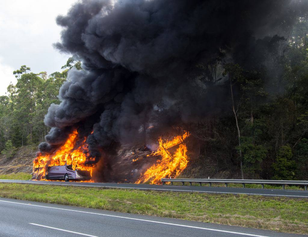 School bus fire on the Bruce Highway. Photo: Craig Burrows School bus fire on the Bruce Highway. Photo: Craig Burrows